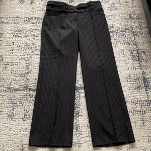 Dolce & Gabbana Black pinstripe 100% wool wide-leg trousers in a size 42 US 4